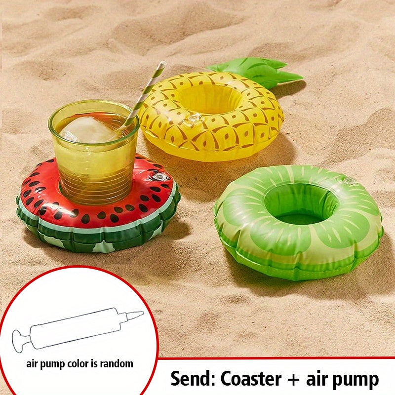 Three inflatable drink coasters shaped like a pineapple, watermelon, and lime on sand with an air pump icon. Flashfy Summer Essentials